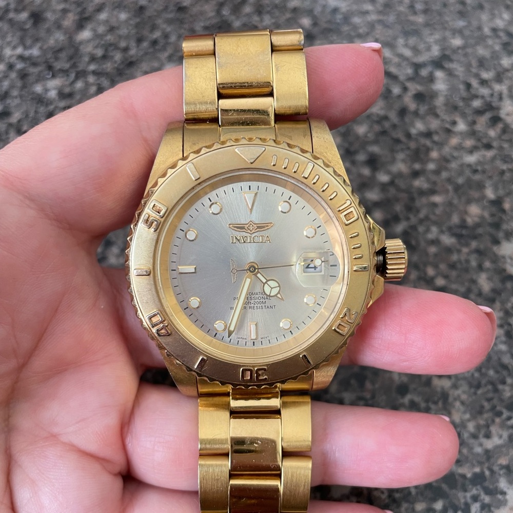 Beautiful Invicta watch. Worn and gently loved. Needs battery.